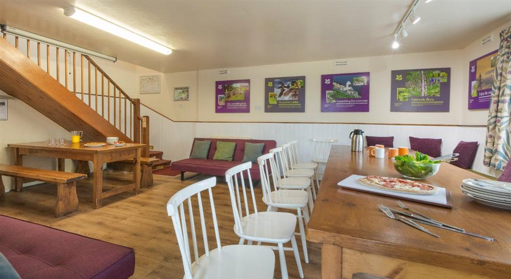 The sitting and dining room at Exmoor Bunkhouse in Lynmouth, Devon