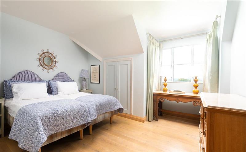 A bedroom in Exmoor Farmhouse at Exmoor Farmhouse, Withypool