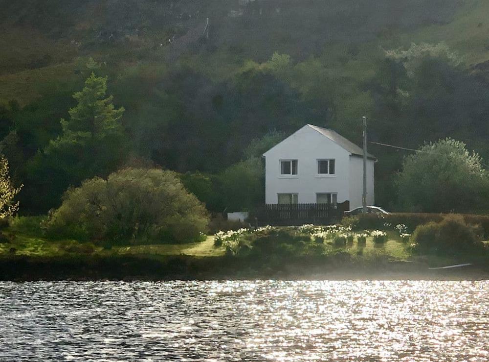 View of holiday home from lake at Fada in  Portree, Isle Of Skye
