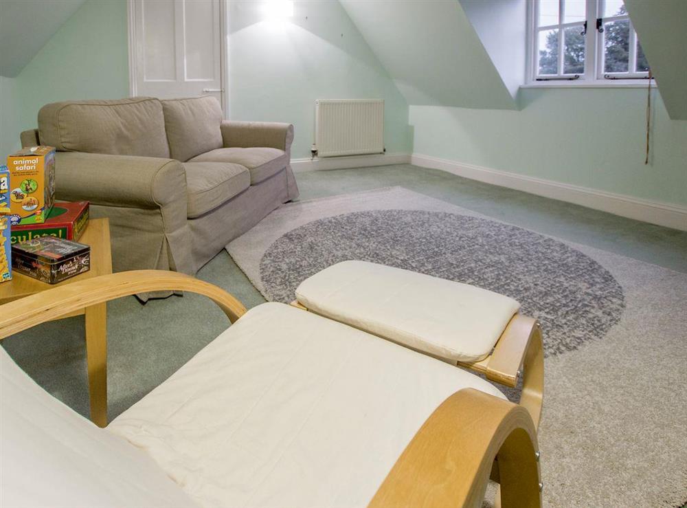 Useful second living room on the first floor at Fair Meadow House in Itteringham, near Aylsham, Norfolk