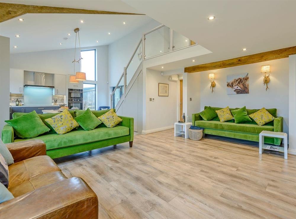 Beautifully decorated open plan living space (photo 2) at Fairchilds Barn, 