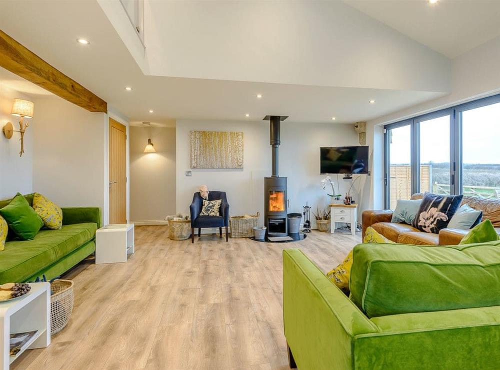 Beautifully decorated open plan living space at Fairchilds Barn, 