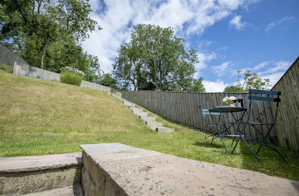 Rear garden seating area with garden furniture at Fairview, Ampleforth, North Yorkshire