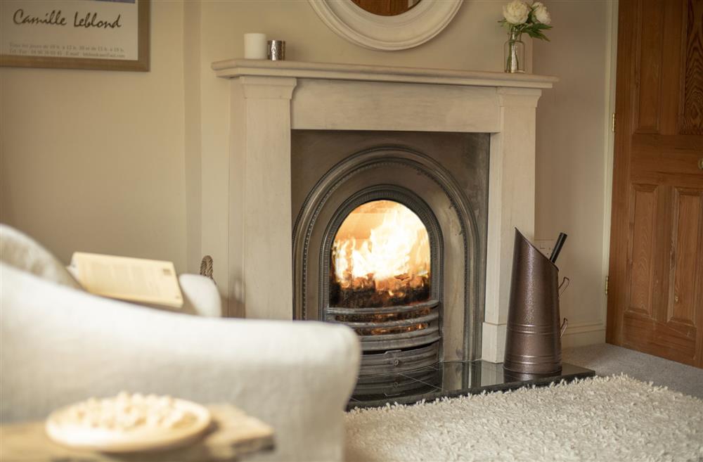 Relax by the open fire in the sitting room of Fairview, Yorkshire at Fairview, Ampleforth, North Yorkshire