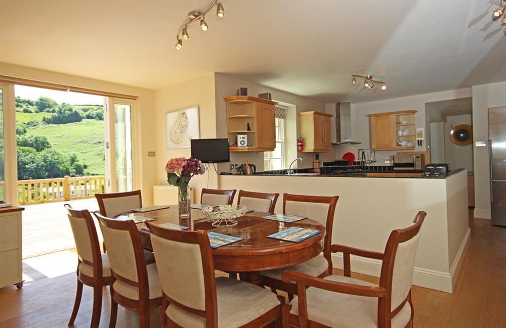 Open plan Kitchen/Dining area with doors to garden at Fairview House in 2 Fairview Road, Dartmouth