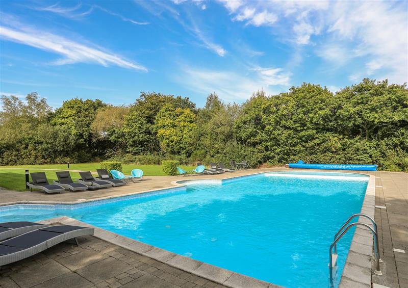There is a swimming pool at Fairview Lodge, Pwllheli