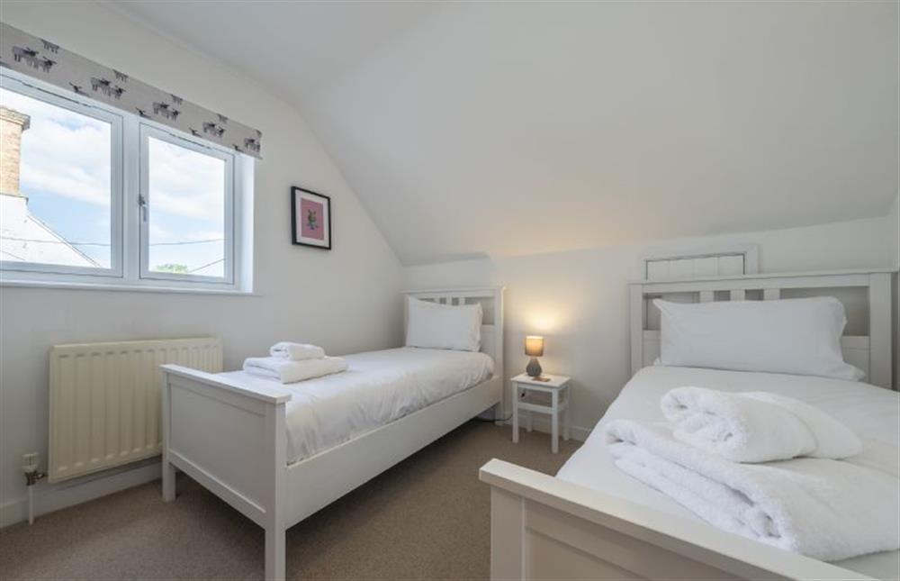 Bedroom four with two 3ft single beds at Fairway, Old Hunstanton