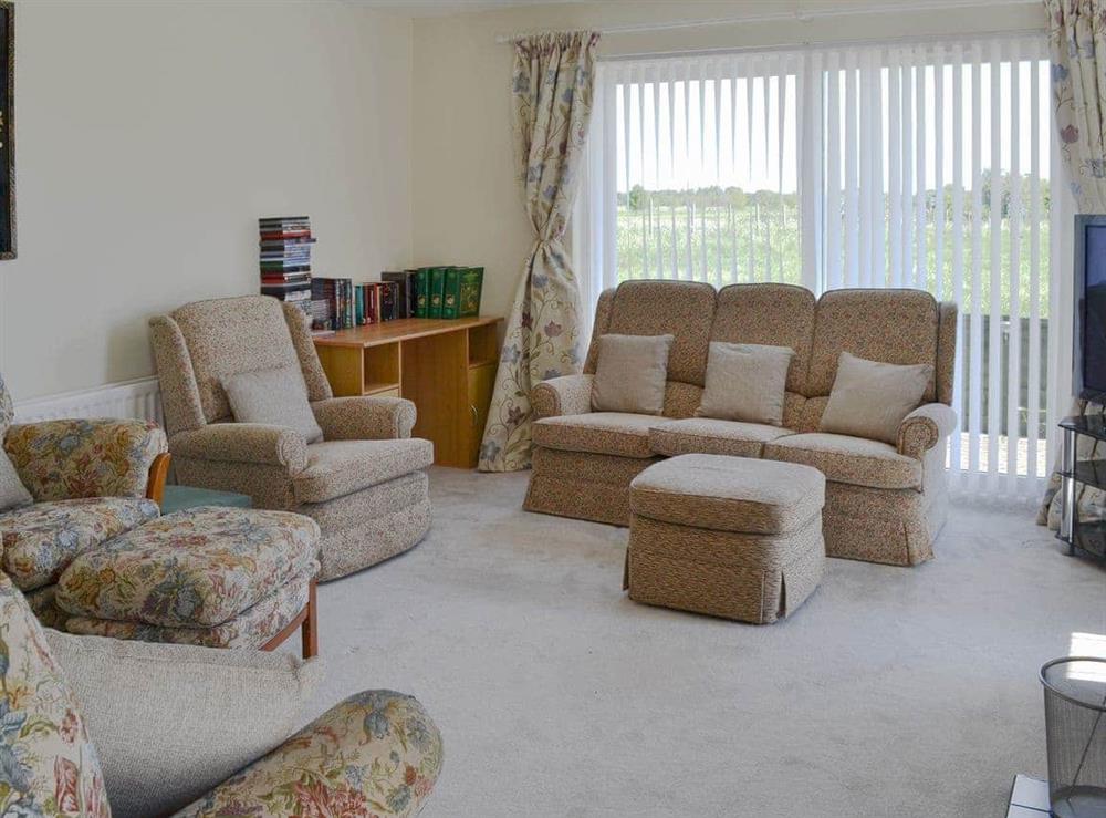 Spacious living room at Fairways Cottage in Belford, near Bambugh, Northumberland