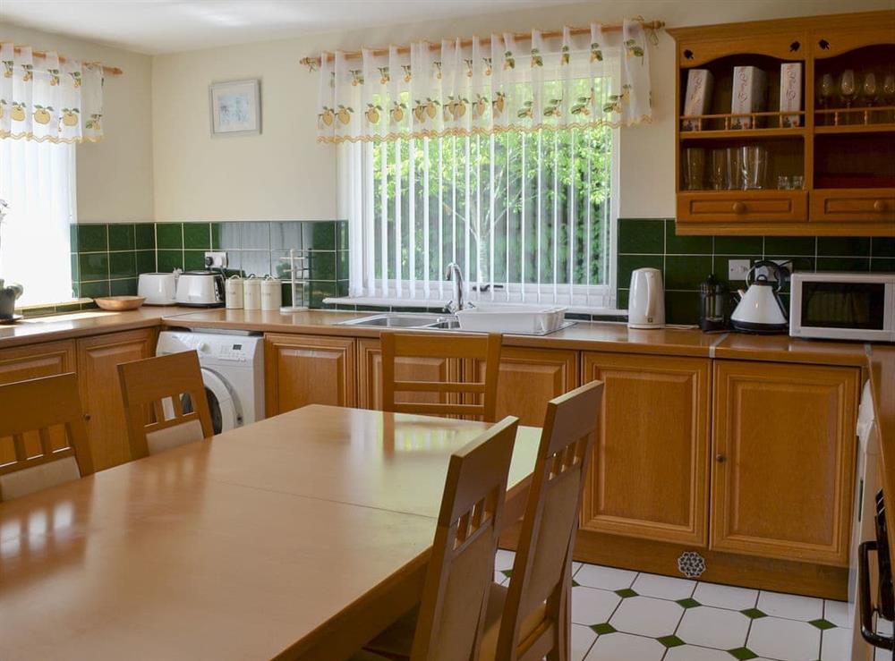 Well equipped kitchen/ dining room at Fairways Cottage in Belford, near Bambugh, Northumberland