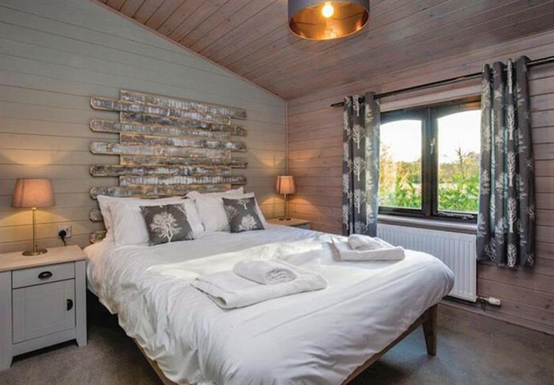Bedroom in the Avocet Lodge VIP at Fairwood Lakes Holiday Park in Dilton Marsh, Nr Frome