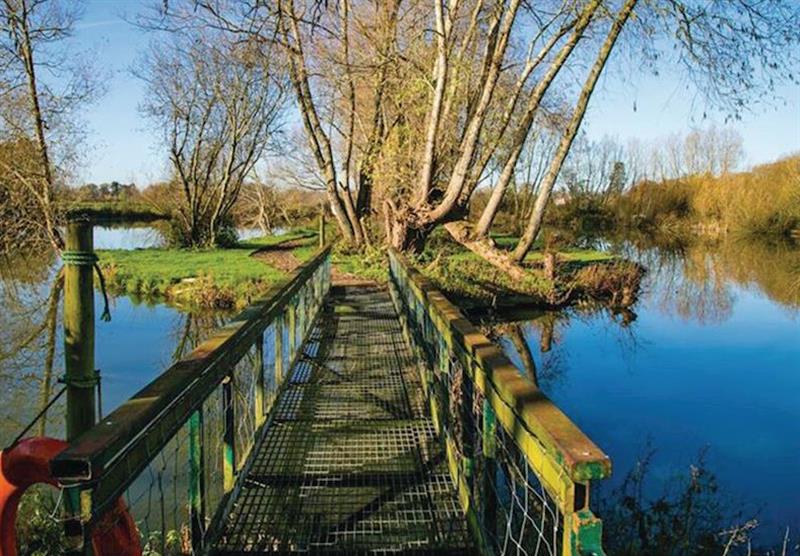 Bridge across the lakes at Fairwood Lakes Holiday Park in Dilton Marsh, Nr Frome