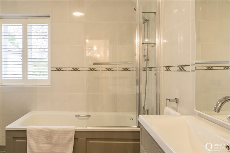 Suite with shower over bath