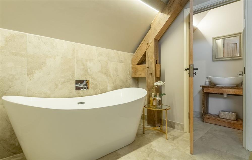 En-suite bathroom with free standing bath at Fallow Folly, Little Massingham