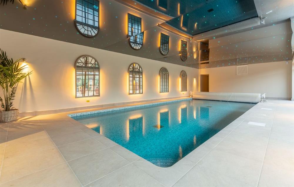 Swimming pool, with LED colour-changing lights and sauna at Fallow Folly, Little Massingham