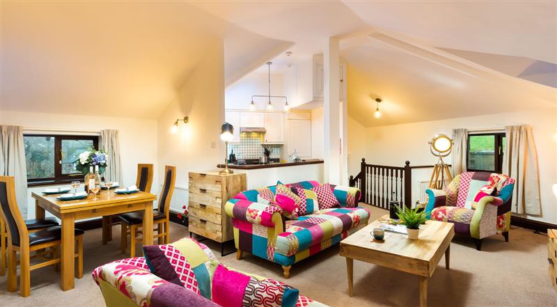 Relax in the living area at Falls View Cottage, Ambleside
