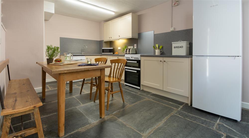 The dining kitchen at Farm Cottage in Pembroke, Pembrokeshire