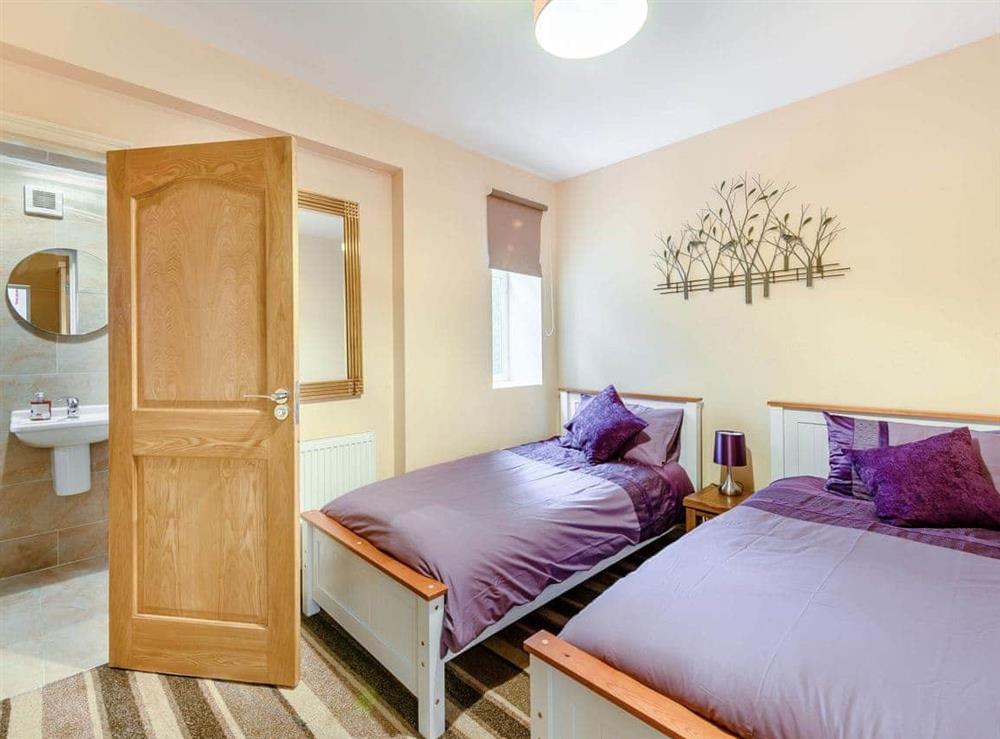 Twin bedroom at Farm Way in Northwood, Hertfordshire