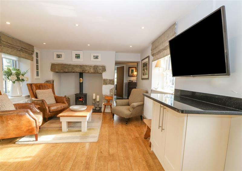 Relax in the living area at Farmhouse, Nefyn