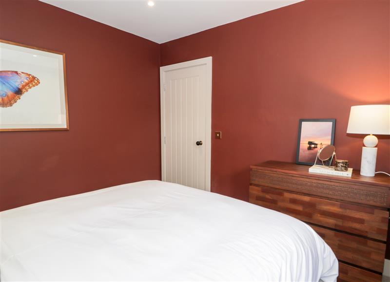 This is a bedroom (photo 3) at Farmyard House, Llanfechell