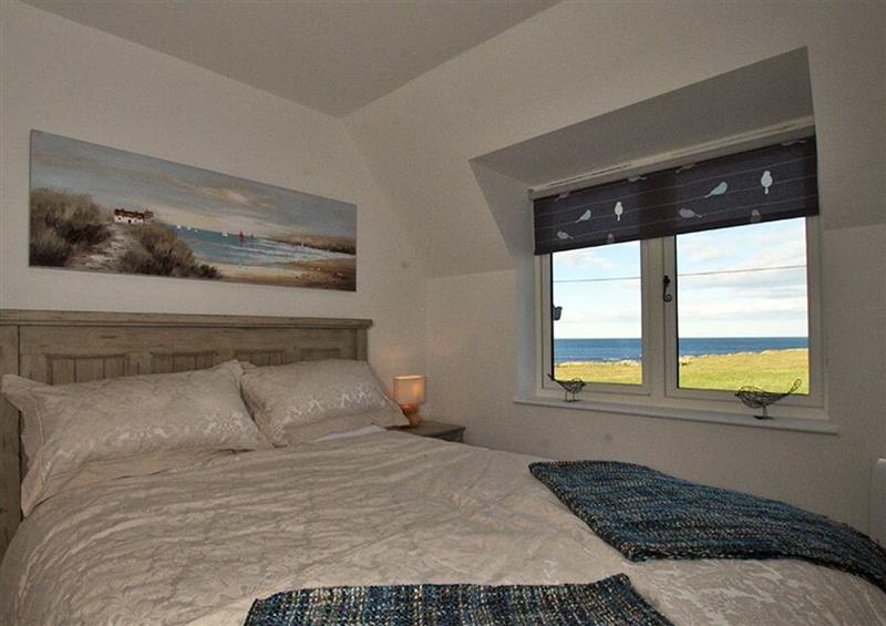 One of the 4 bedrooms at Farne Cottage, Beadnell