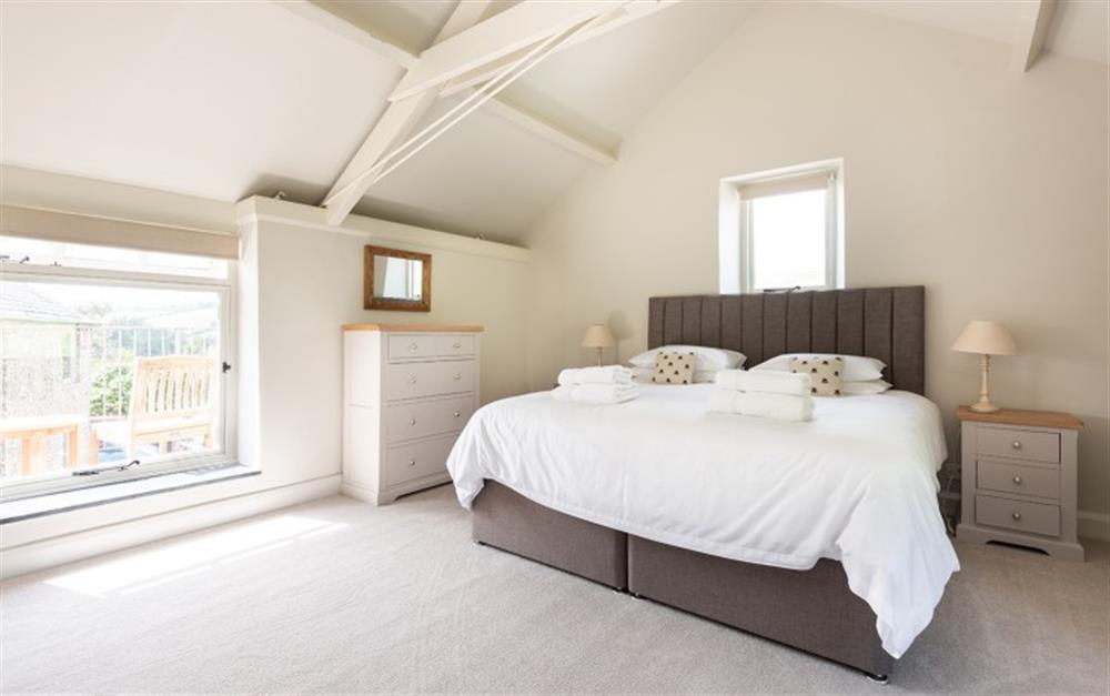 The master bedroom with views over the paddock to the rear. at Farthingfield in South Pool