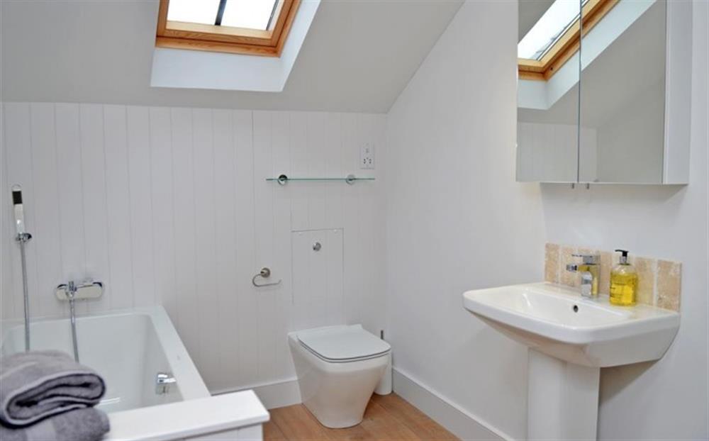 The family bathroom with bath and separate shower cubicle at Fastnet in Salcombe