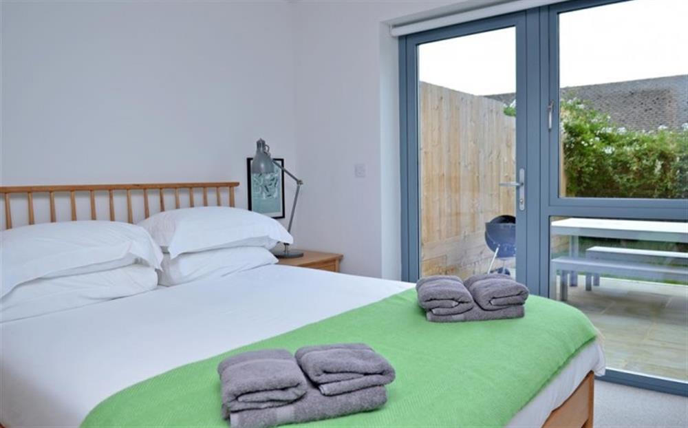 The ground floor double room with access to the garden at Fastnet in Salcombe
