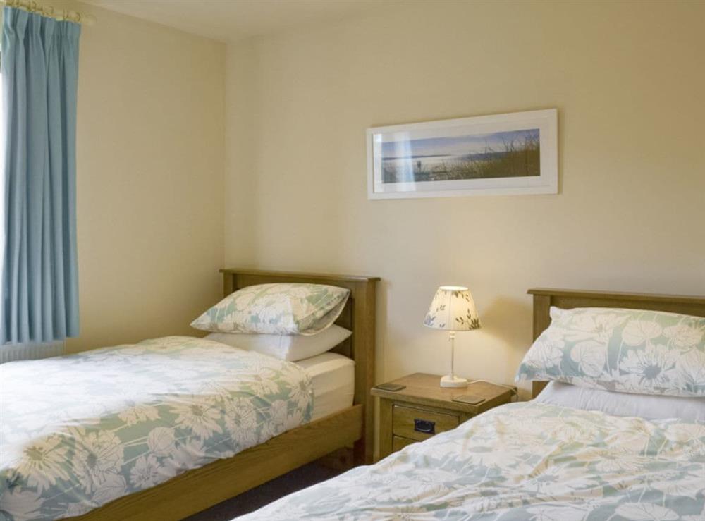 Light and airy twin bedroom at Hazel Lodge, 