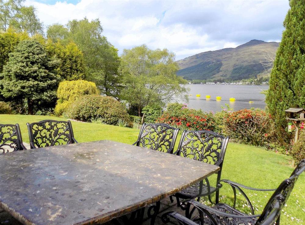 Delightful sitting out area with views of the beautiful surrounding area at Feaugh Cottage in Lochgoilhead, near Inverary, Argyll and Bute, Scotland