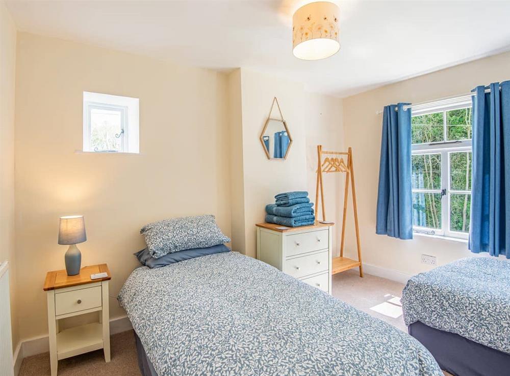 Twin bedroom at Felin Cottage in Knighton, Powys