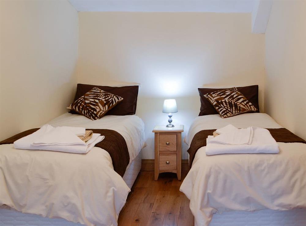 Bedroom with twin single beds at Felin Goyan in Tregaron, near Lampeter, Cardigan/Ceredigion, Dyfed