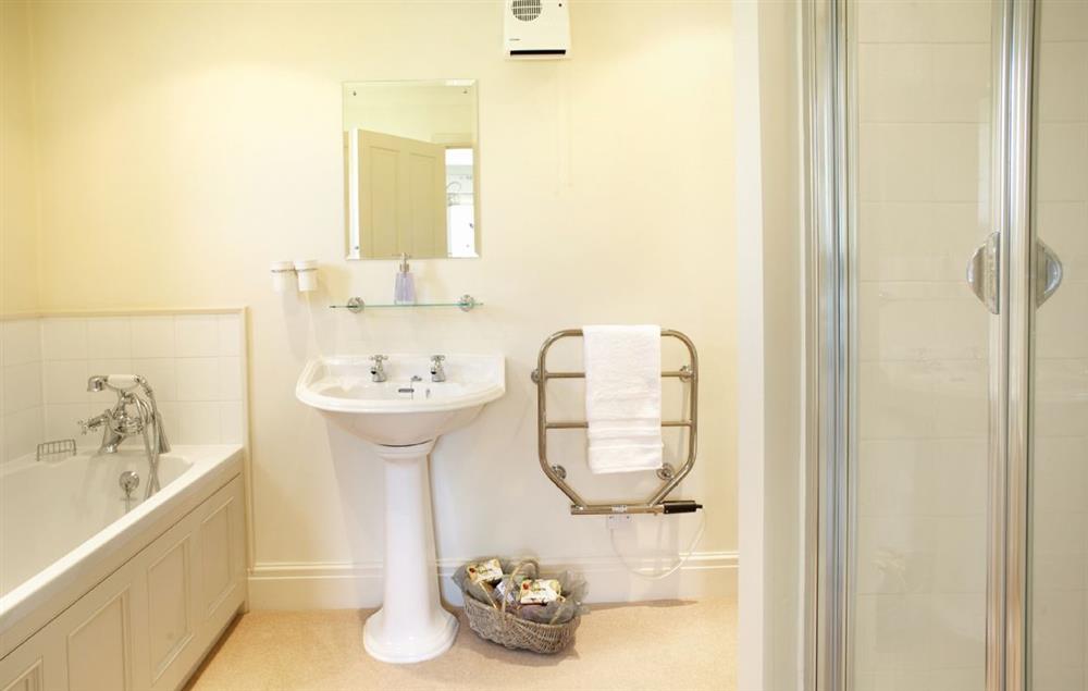 En-suite bathroom to master bedroom with bath and separate shower at Fell Beck, Burnsall