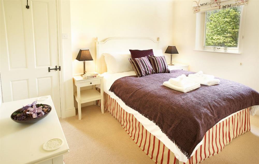Master bedroom with 5’ bed at Fell Beck, Burnsall