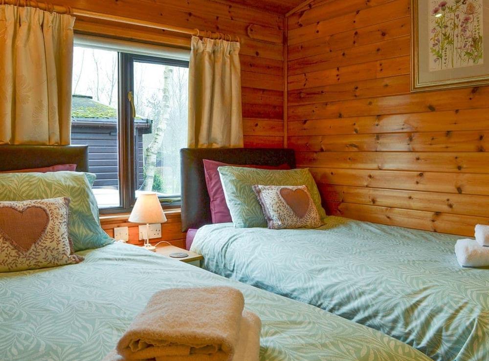 Comfortable twin bedroom at Fell Foot Lodge in Keswick, Cumbria