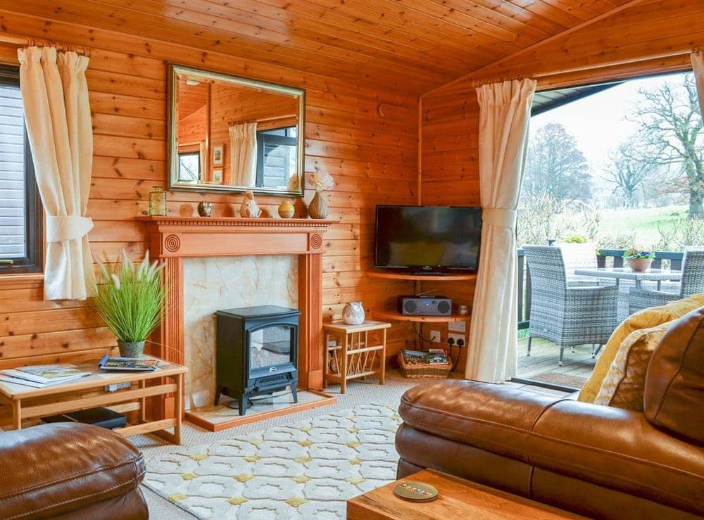 Homely open-plan living space at Fell Foot Lodge in Keswick, Cumbria