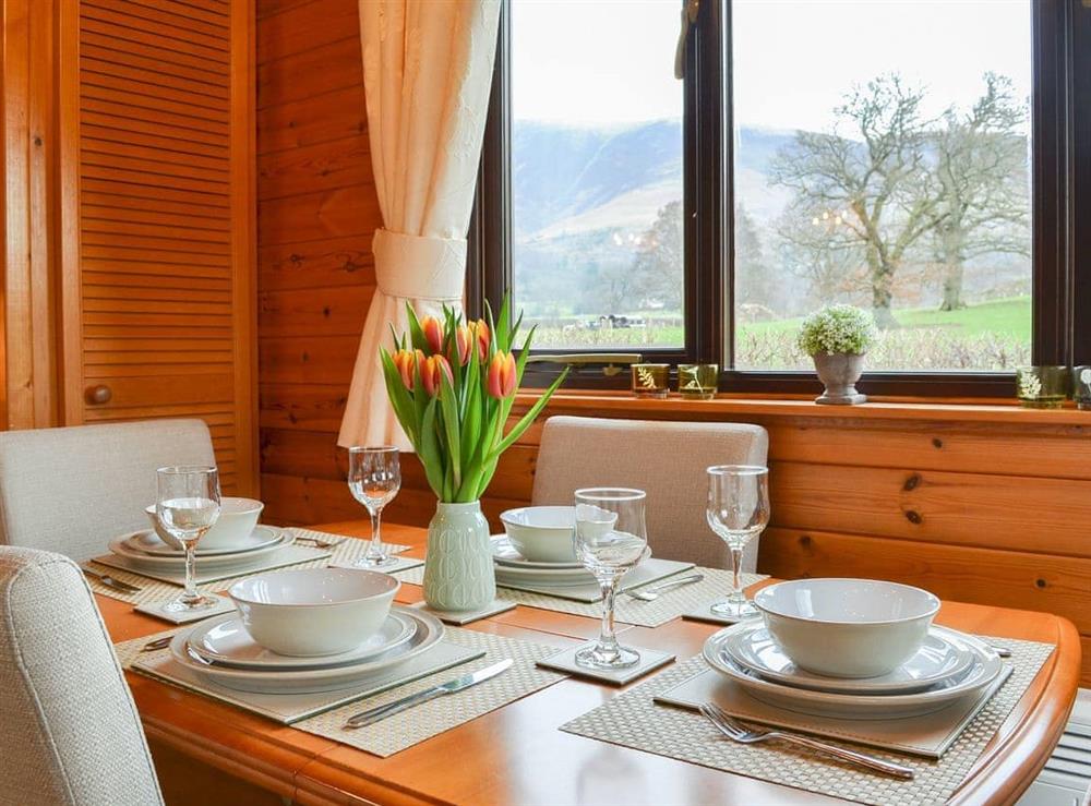 Stunning dining area with wonderful view at Fell Foot Lodge in Keswick, Cumbria