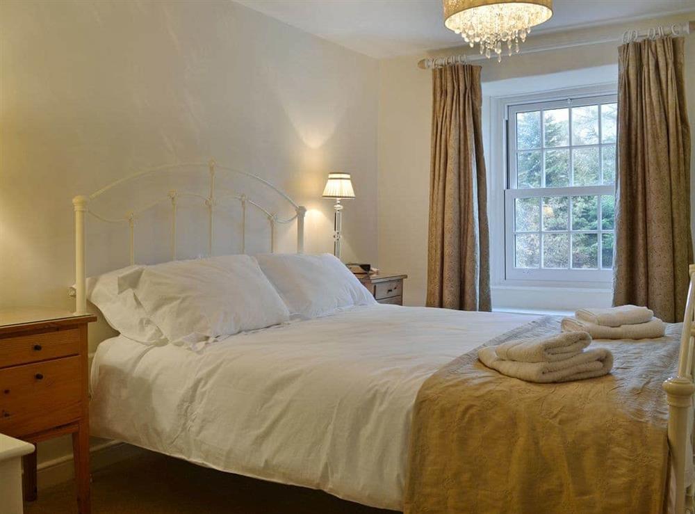 Elegantly decorated double bedroom with kingsize bed at Fellmere (Deluxe) in Ambleside, Cumbria