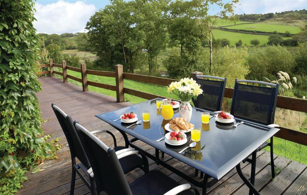 The decked patio and surrounding countryside.The Cumbria Way passes the front of the property, ideal for walkers