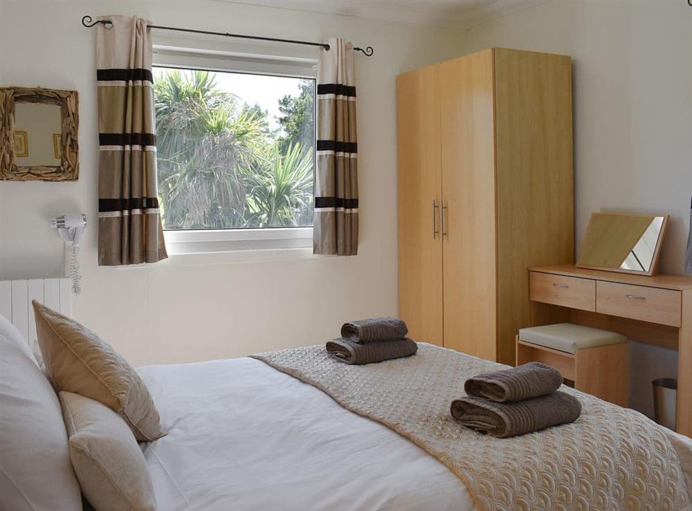 Comfortable double bedroom with en-suite shower room at Fellview in Brodick, Isle Of Arran