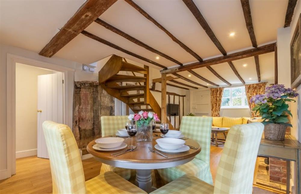 Dining table with seating for four at Fenwick Cottage, Higham