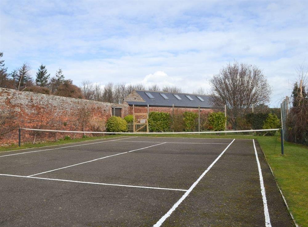 All weather tennis court at Ferguson in Bamburgh, Northumberland., Great Britain