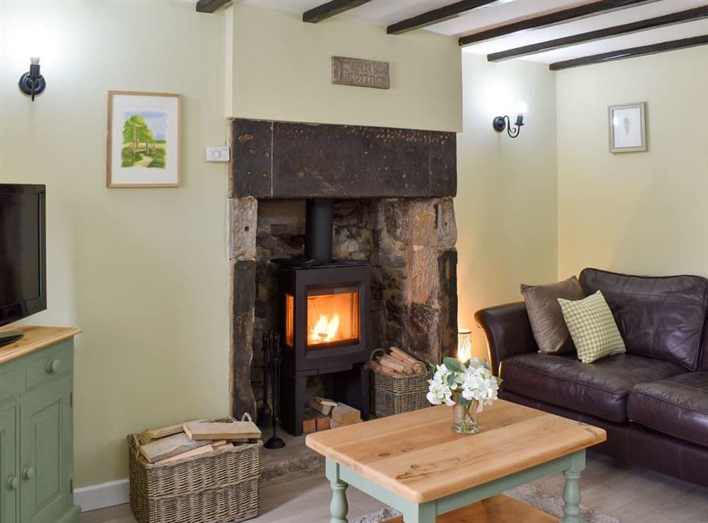 Delightful living room with beamed ceiling at Fern Cottage in Bradwell, Derbyshire