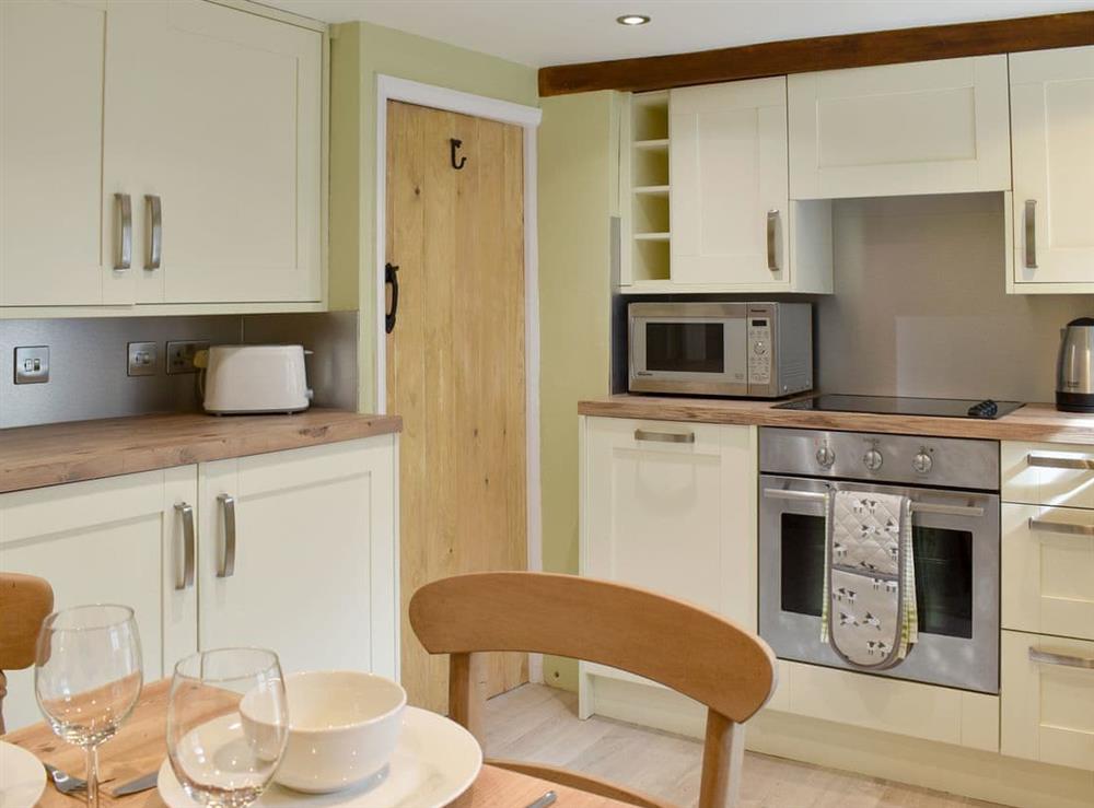 Well equipped kitchen/ dining room at Fern Cottage in Bradwell, Derbyshire