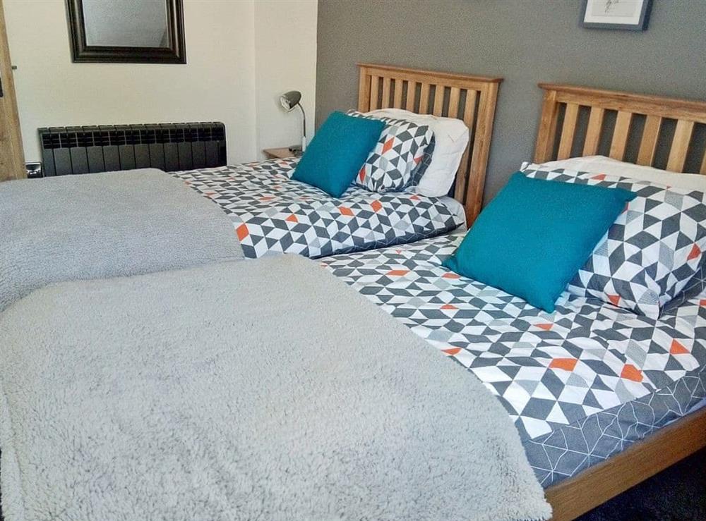 Charming twin bedroom at Fern Cottage in Whitby, North Yorkshire