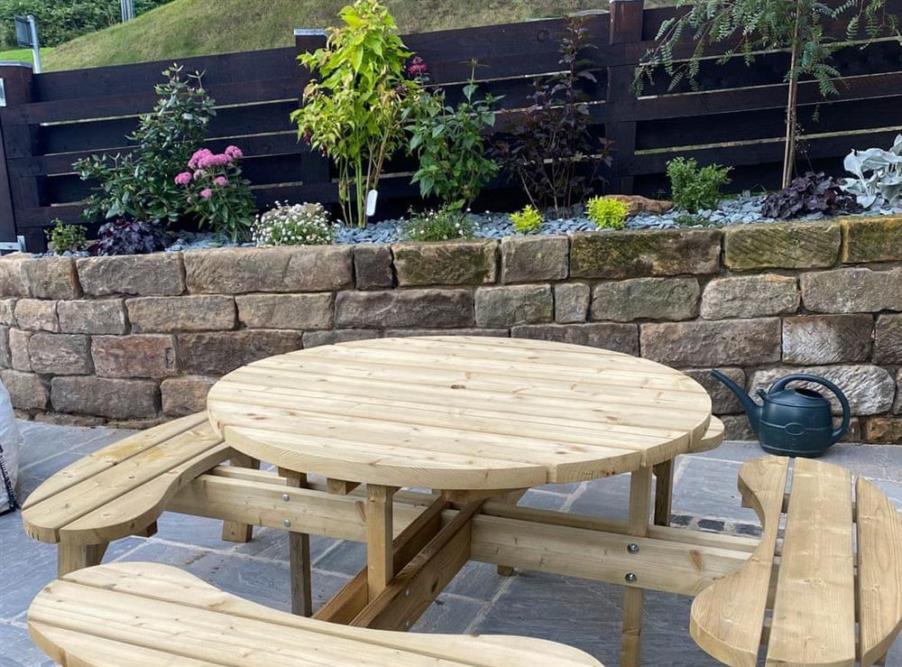 Outdoor furniture on the patio at Fern Cottage in Whitby, North Yorkshire