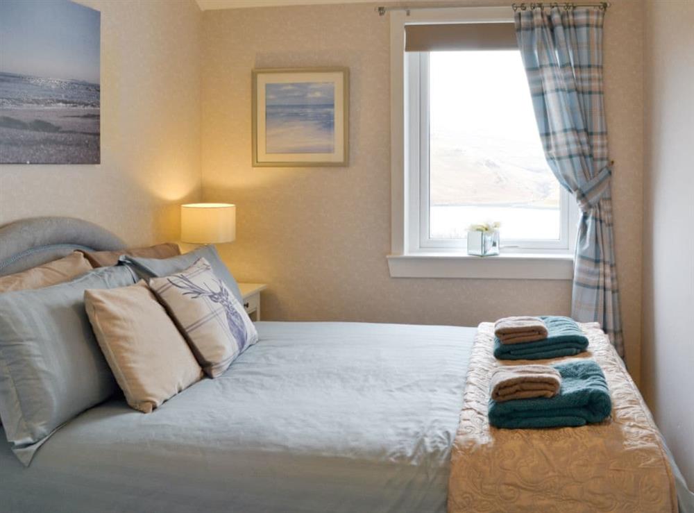Relaxing double bedroom at Fernilea Cottage in Fernilea, near Portree, Isle Of Skye