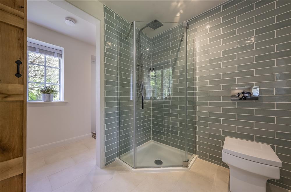 The family bathroom with a separate walk-in shower at Fernwood, Rolvenden