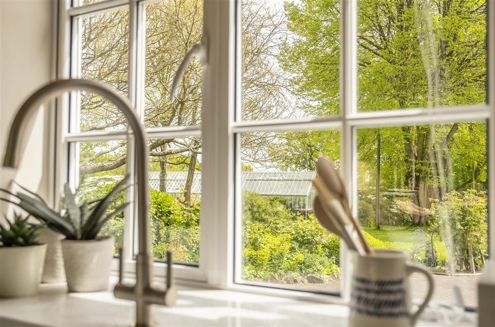 The kitchen with beautiful views at Fernwood, Rolvenden
