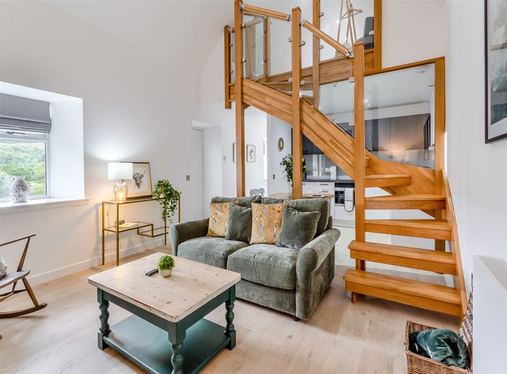 Open plan living space at Ferry Cottage in Aigas, near Beauly, Inverness-Shire