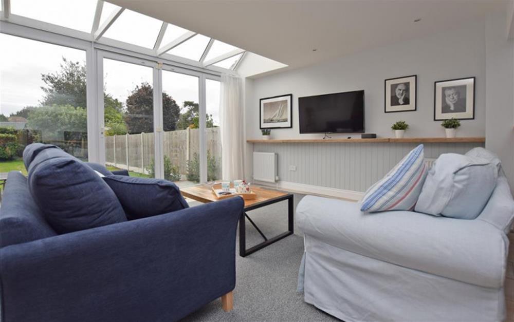 Smart tv and comfortable sofas at Ferry Cottage in Lymington